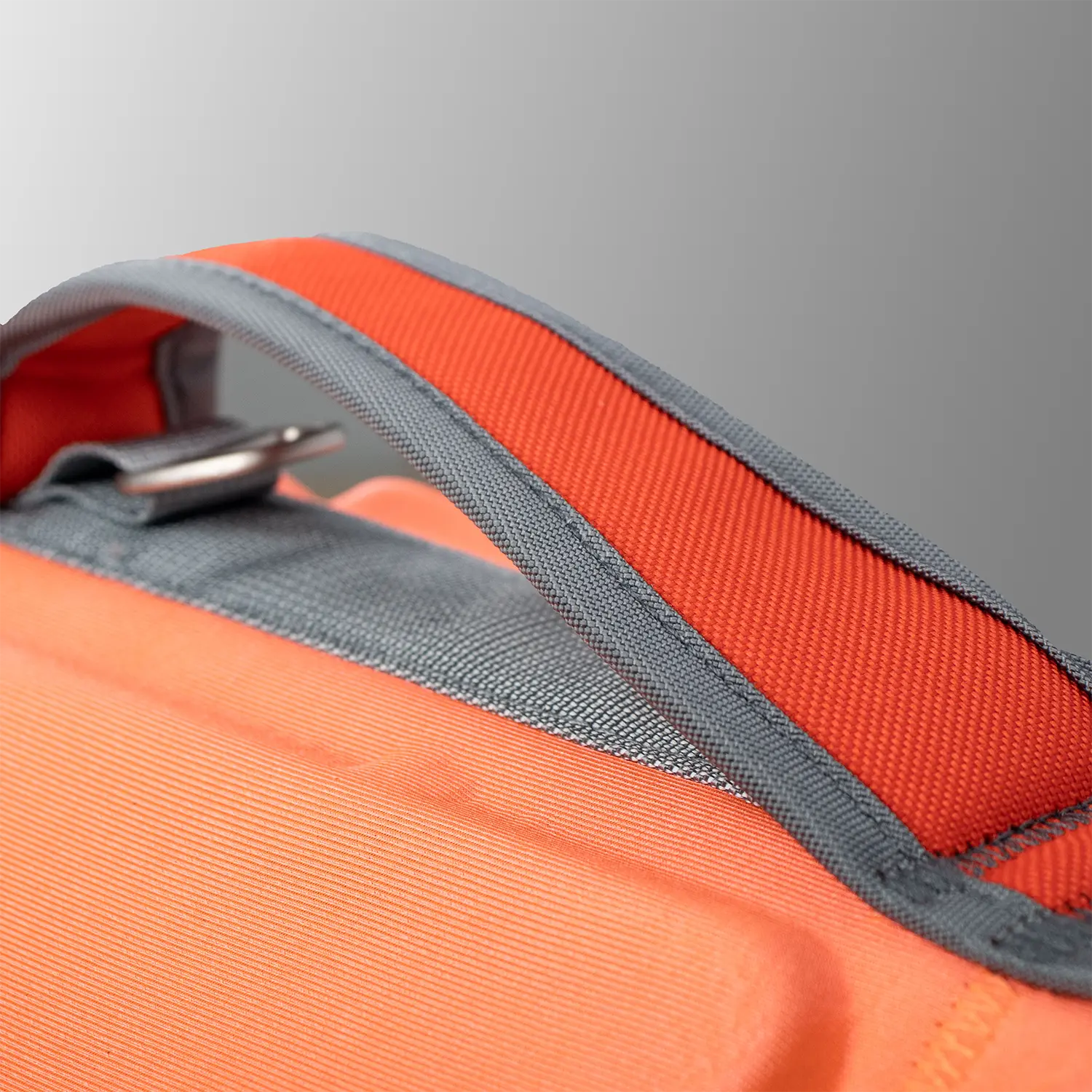 Bright yellow dog life preserver with rescue handle