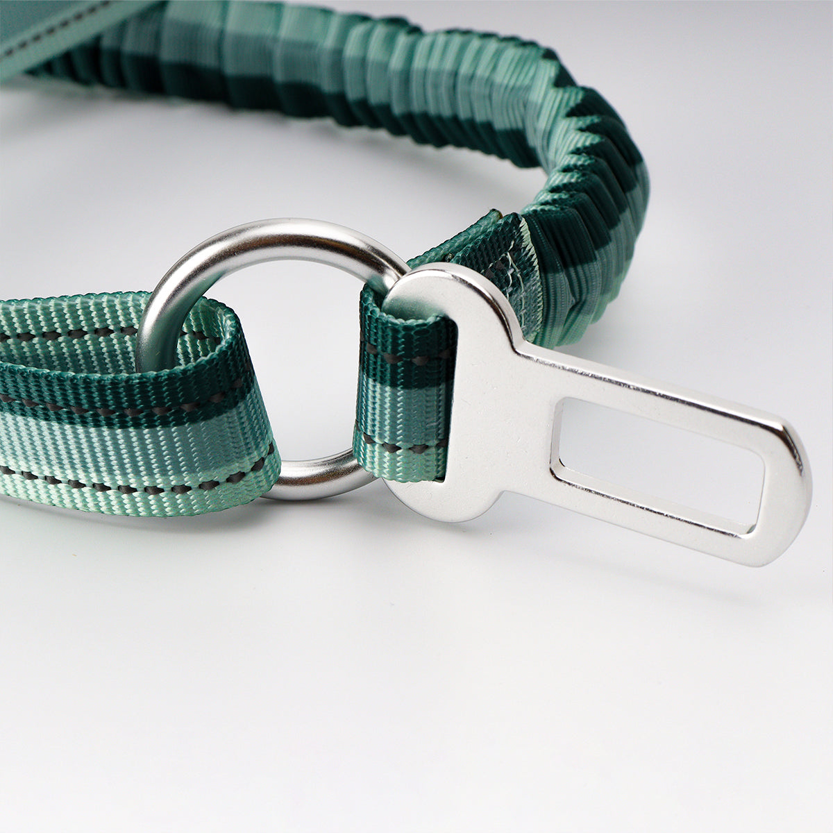 Dog leash with car attachment clipped into a car for travel safety